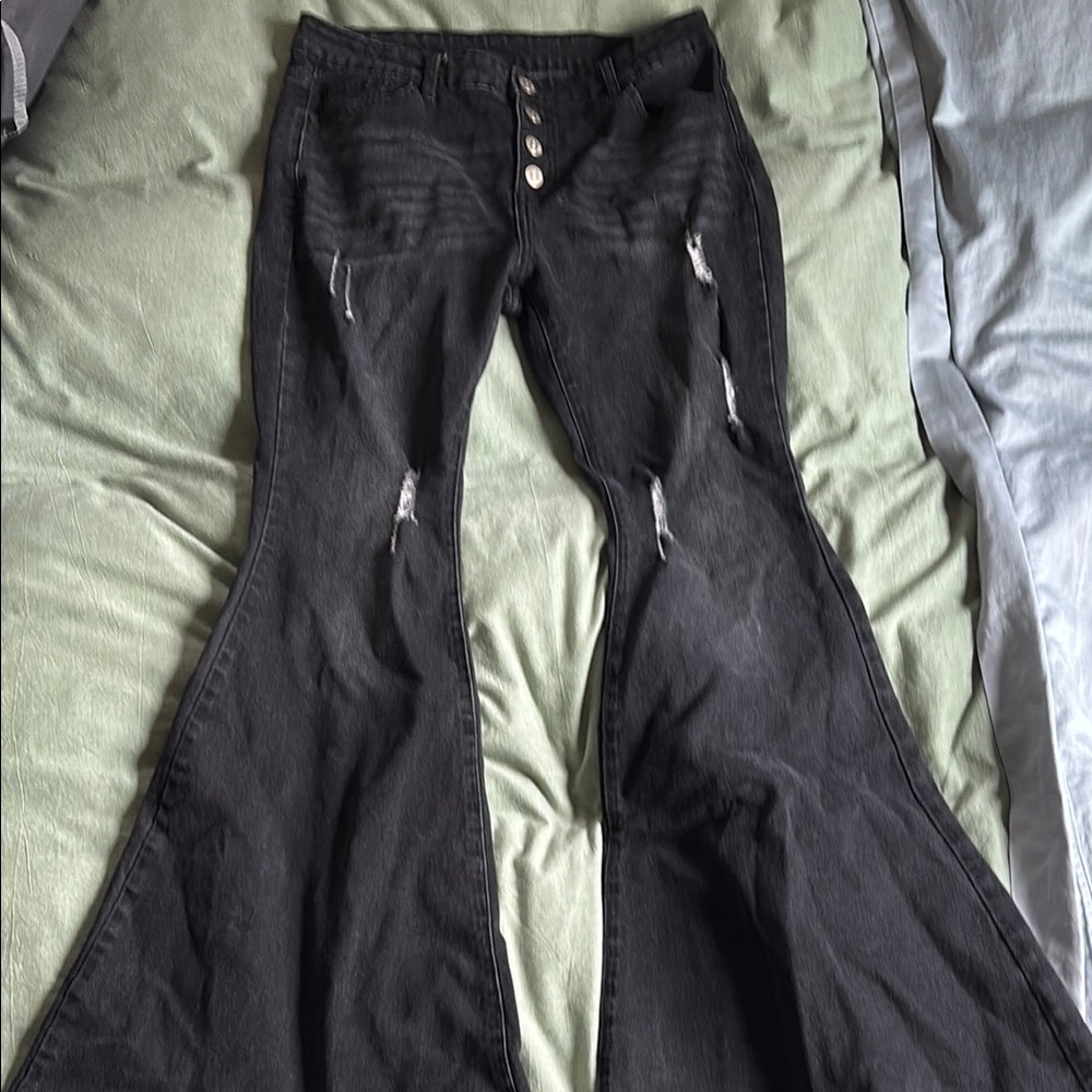 Black Flared Jeans with Distressed Details